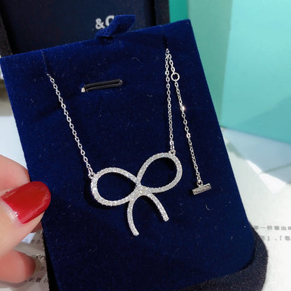 [Hevara Jewelry]CLAW SET RHODIUM PLATED BOW NECKLACE