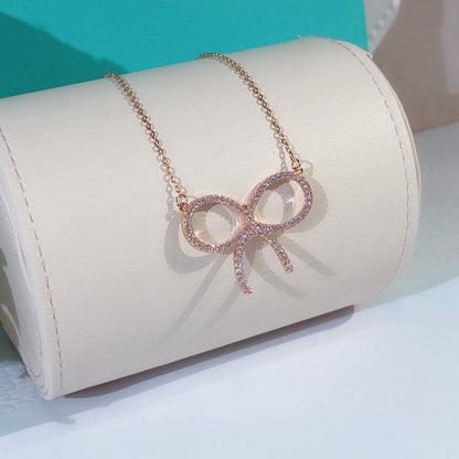 [Hevara Jewelry]CLAW SET RHODIUM PLATED BOW NECKLACE